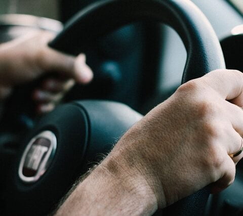 Image of a diverse group of people learning to drive at Sivnath Motor Training Center.